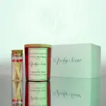 Crimson matte jar candle with jasmine scent from the Haven Essence line by Rocky Scent, shown with matches and branded packaging.