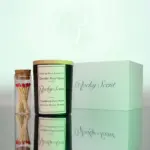 Obsidian matte black soy candle with jasmine scent, part of Rocky Scent’s Haven Essence collection, styled with matches and box.